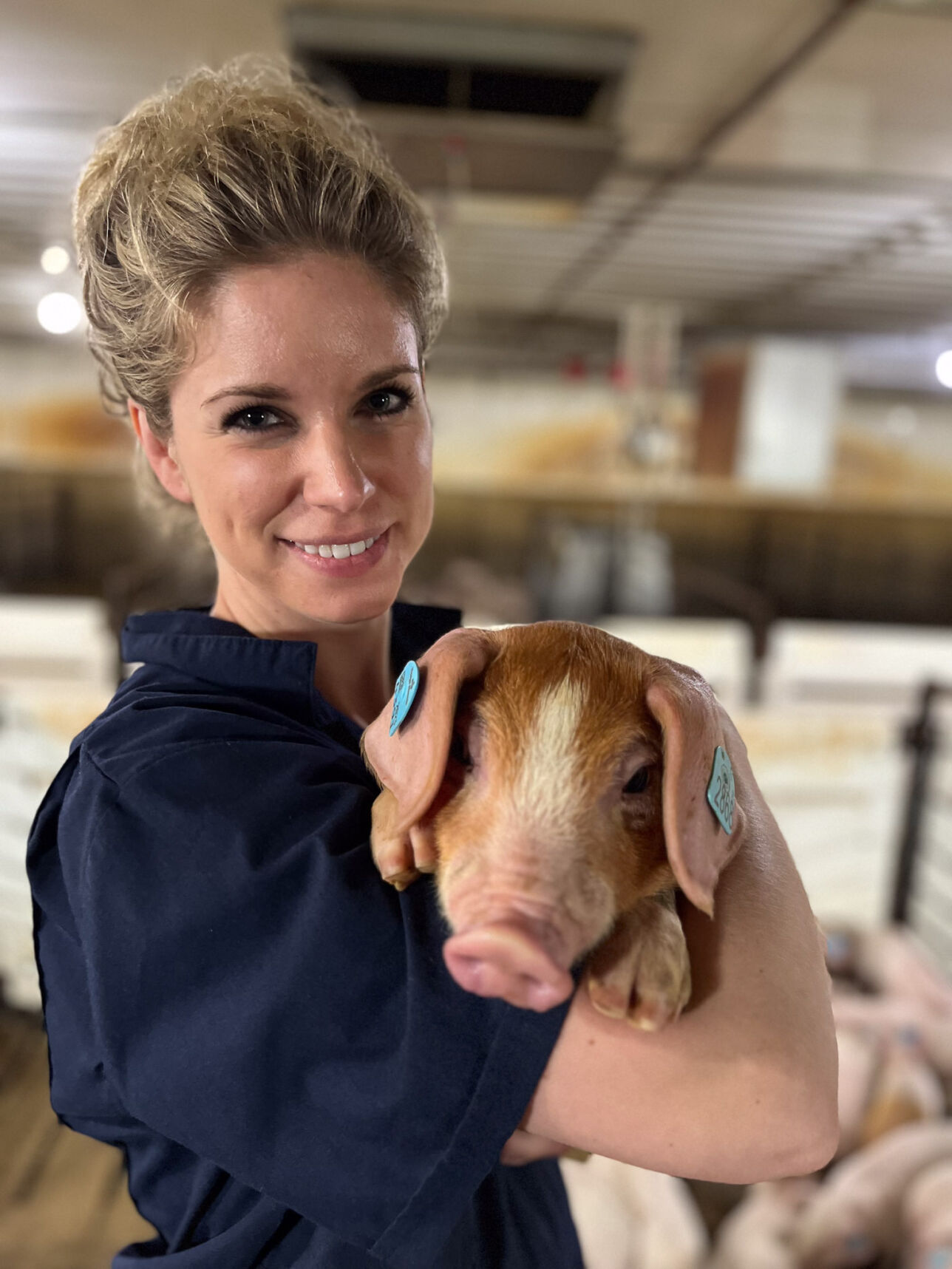 Jenelle Dunkelberger, Topigs Norsvin, with pig